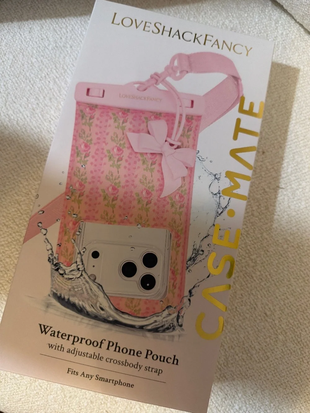 LoveShackFancy waterproof phone pouch